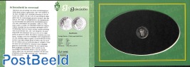 Silver token in folder, 10 years Queen Beatrix